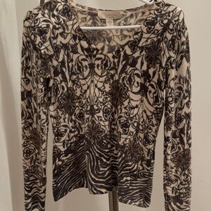 Soft and cozy Cashmere Sweater in shades of brown,dark gray and beige.